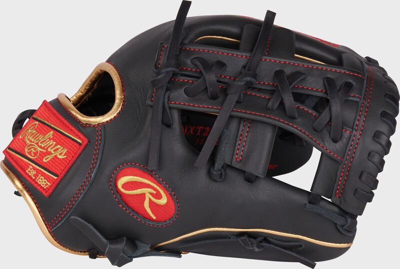 Thumb of a dark shadow NXT Series 11.5" ContoUR Fit infield glove with a split, laced single post web loading=
