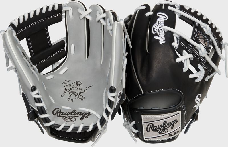 Two images showing the palm & back of a gray/black Chicago White Sox Heart of the Hide glove loading=