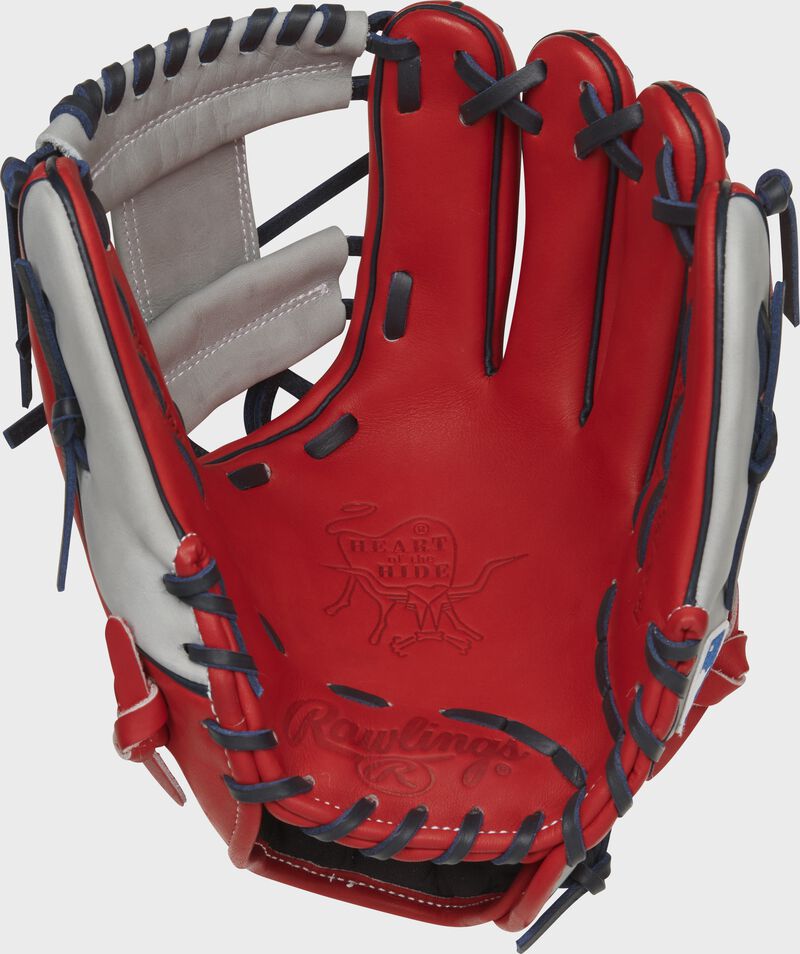 Shell palm view of scarlet, gray, and navy 2021 Los Angeles Angels Heart of the Hide glove loading=