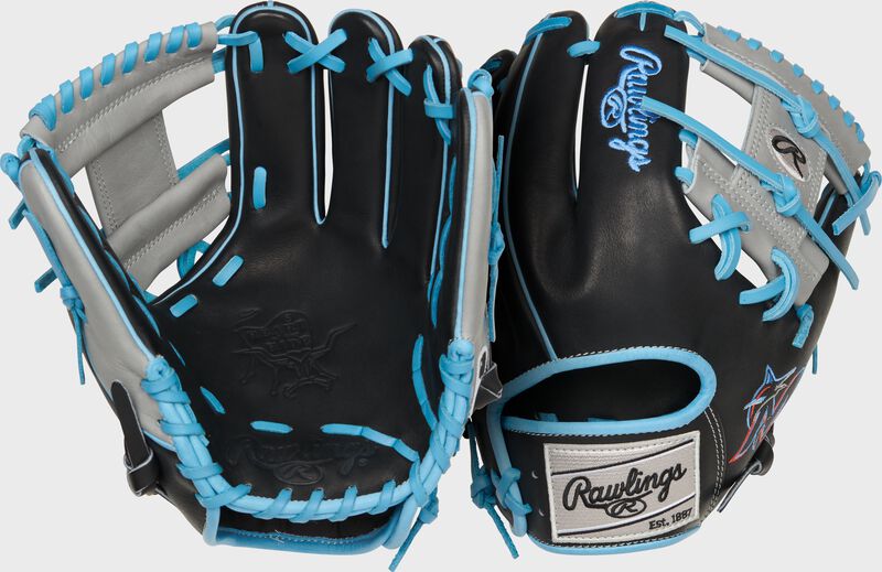 Two images showing the palm & back of a black/gray Miami Marlins Heart of the Hide glove loading=
