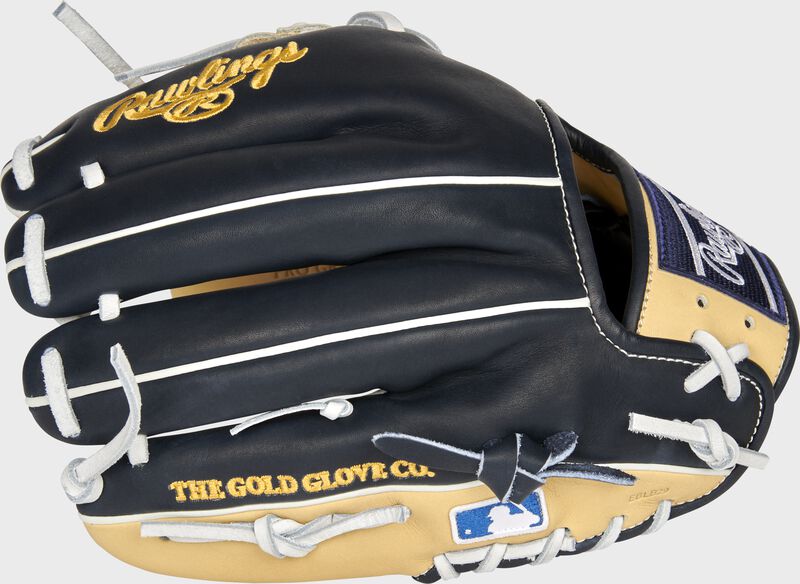 Back of a navy/camel Milwaukee Brewers Heart of the Hide infield glove with the MLB logo on the pinky - SKU: RSGPRO204-2MIL loading=
