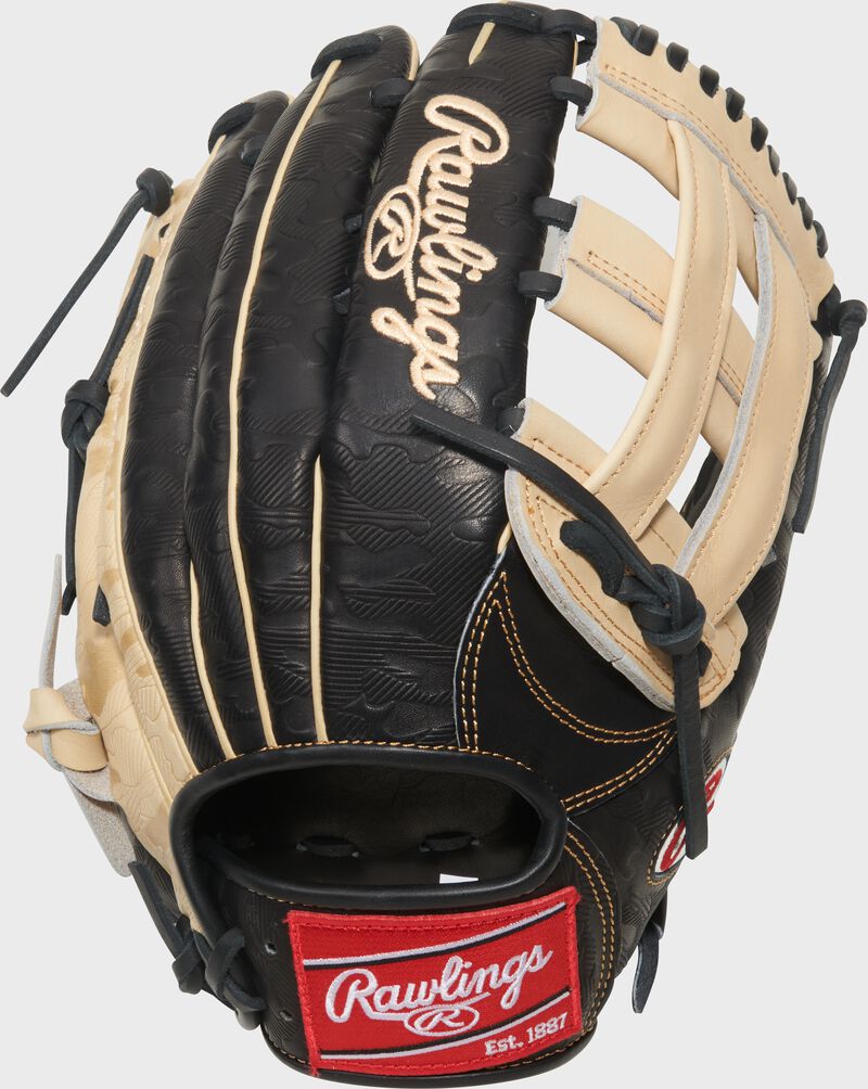 Black back of a Gameday 57 Series Fernando Tatís Jr. Heart of the Hide Glove with a red Rawlings patch loading=