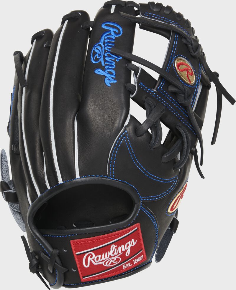 Black back of a Marcus Semien Heart of the Hide glove with a red Rawlings patch - SKU: RSGPRO44L-2MS loading=