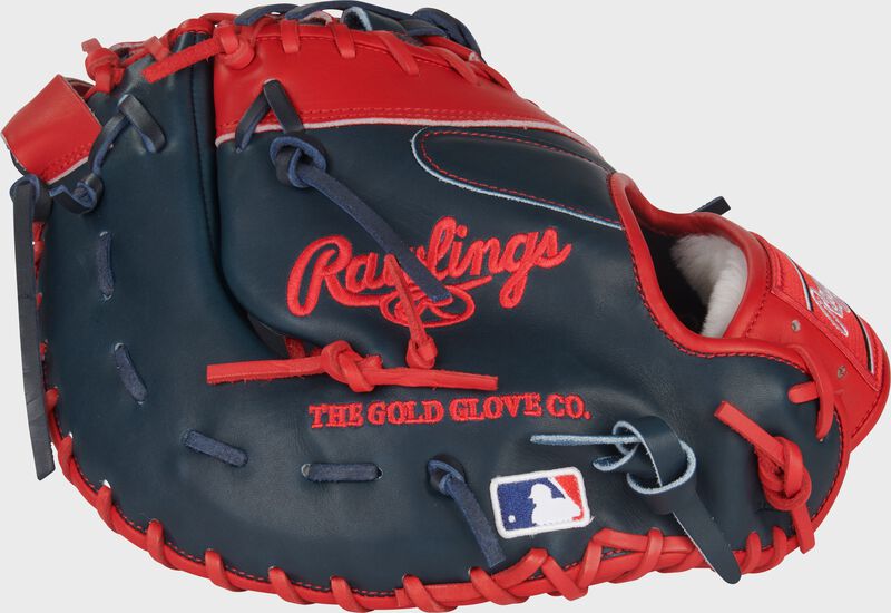 Navy back of a Gameday 57 Series Vladimir Guerrero Pro Preferred 1st base mitt with a MLB logo loading=