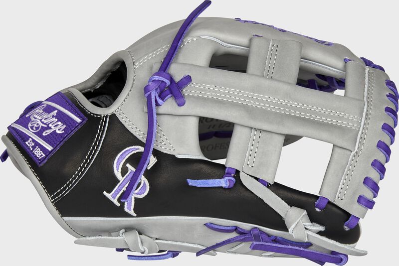 Thumb of a 2021 Colorado Rockies Heart of the Hide glove with the Rockies logo on the thumb: SKU: RSGPROTT2-20COL loading=