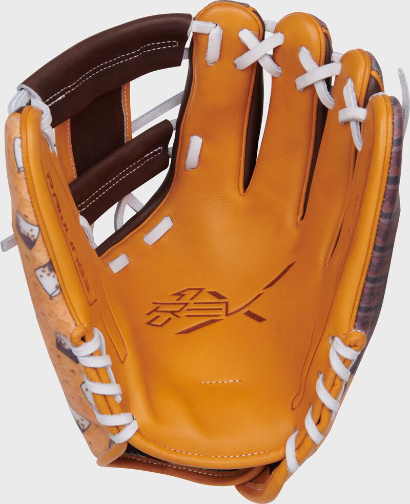 Tan palm of a Rawlings S'mores REV1X glove with white laces loading=