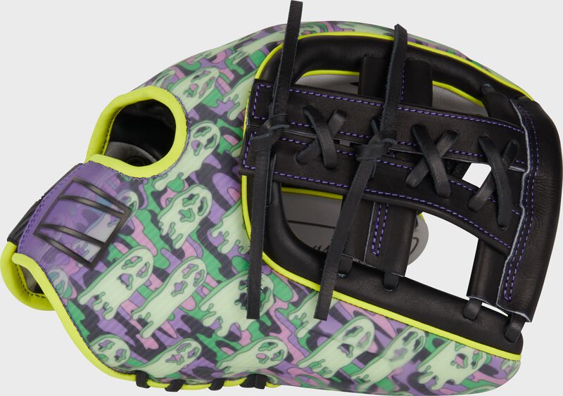 Thumb of a Limited edition REV1X Halloween infield glove with a black split, laced single post web loading=
