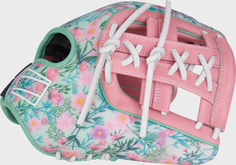 Thumb of a floral Rawlings Mother's Day REV1X glove with a pink X-laced single post web loading=