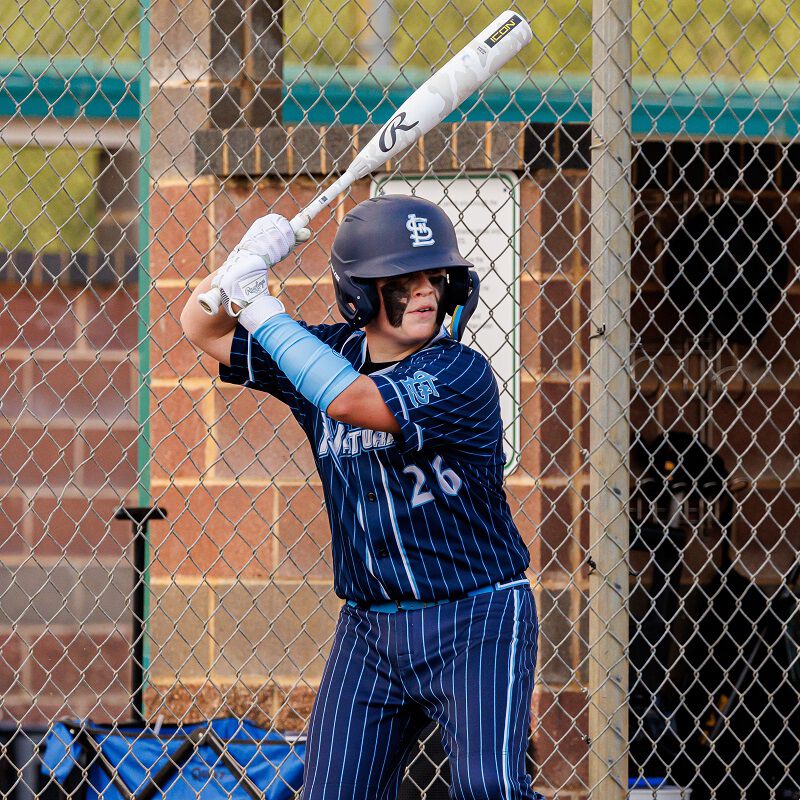 Picture of a player in his batting stance with a 2025 Icon USSSA baseball bat loading=